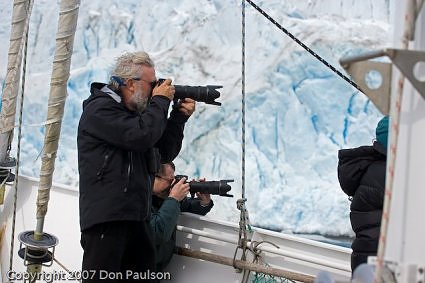 Hand Holding a Telephoto Lens